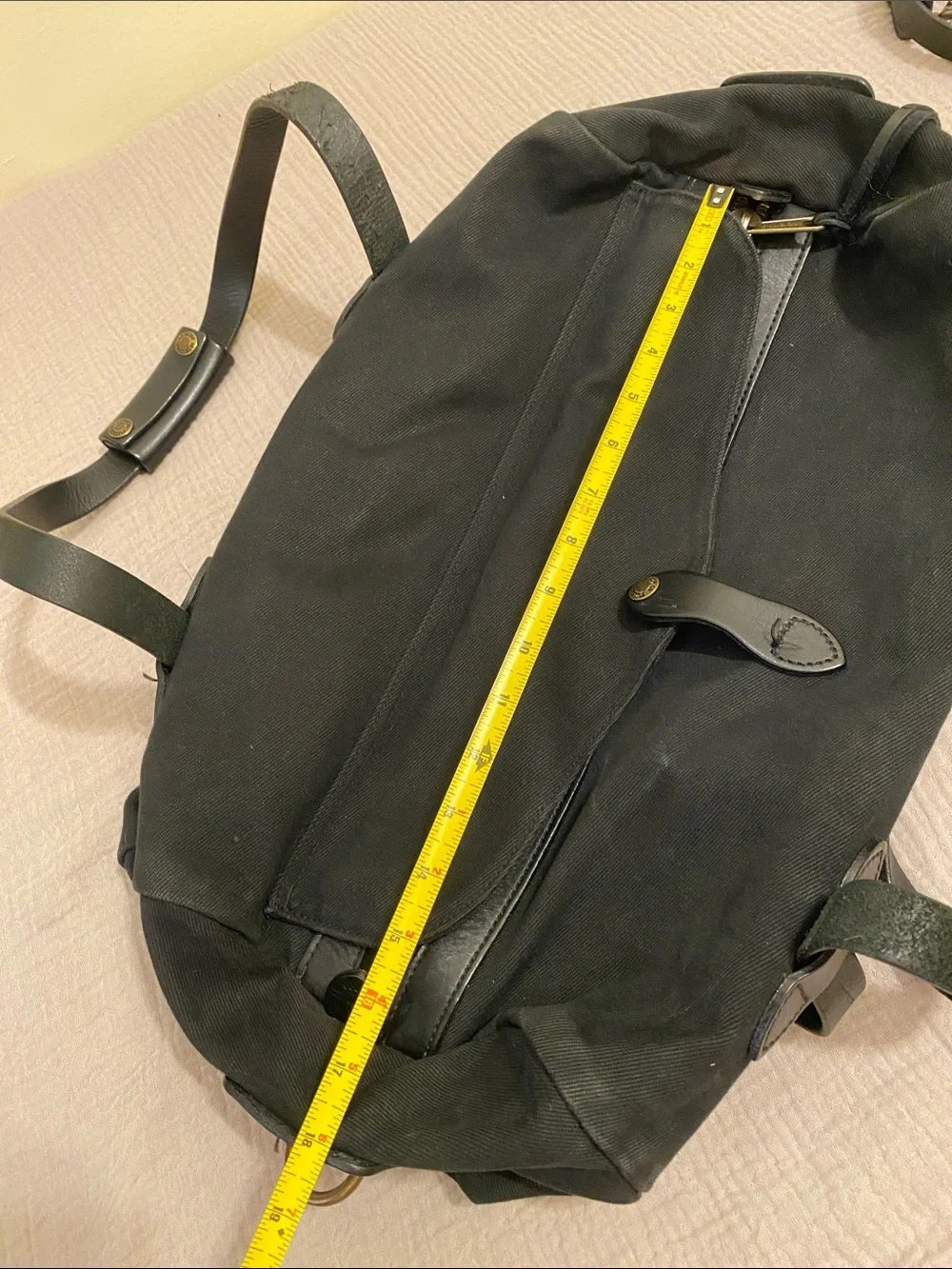 FILSON  BLACK TWILL DUFFLE BAG .